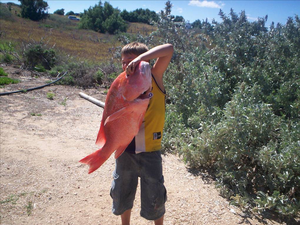 my cuz jack with 11kg red emperor  