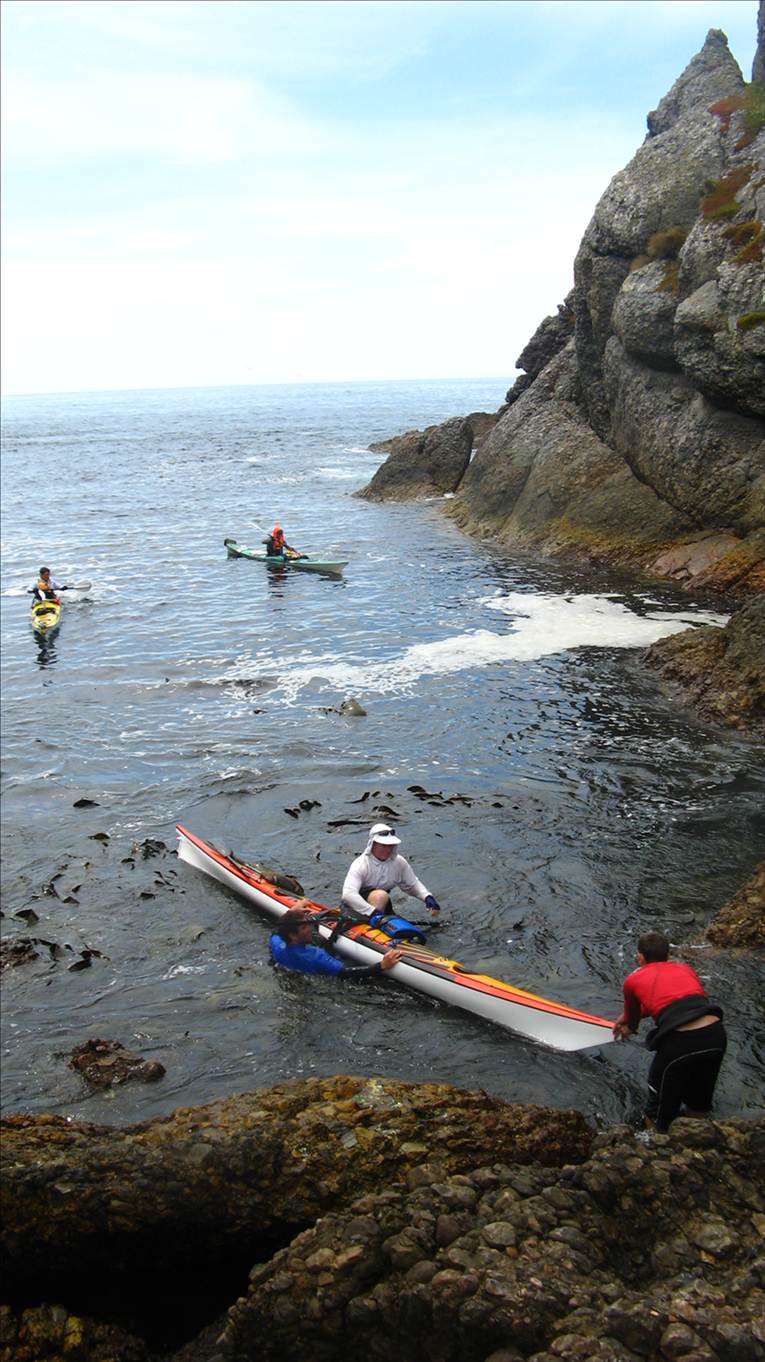 Landing 6 composite sea kayaks on Albatross Island