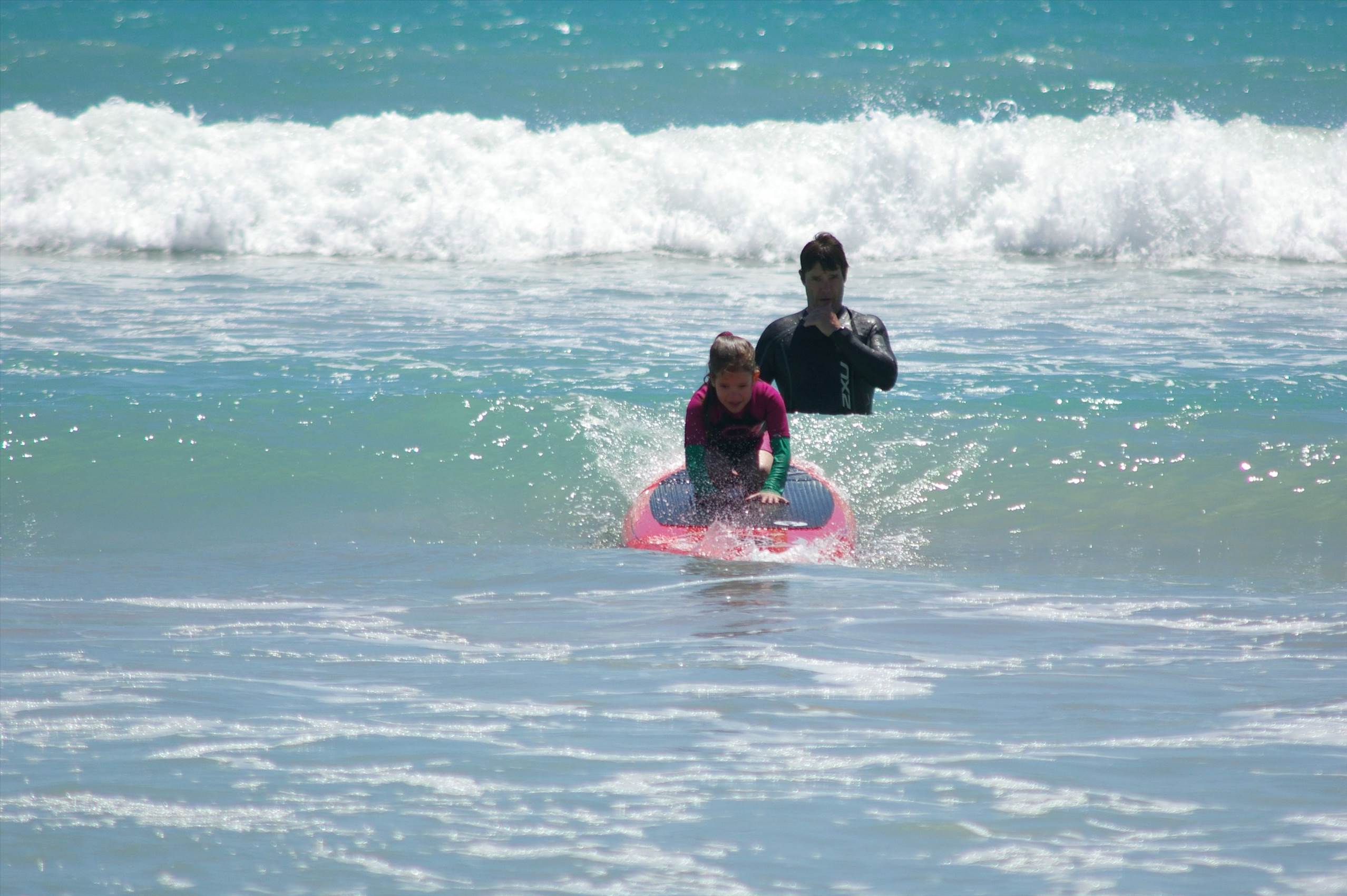 Kids learn to surf