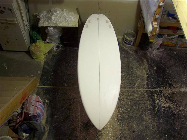 brookos shaped 8'6 showing box inserts