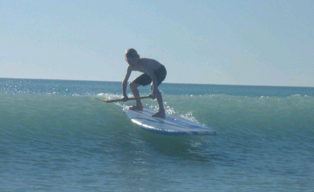 robbie surfing