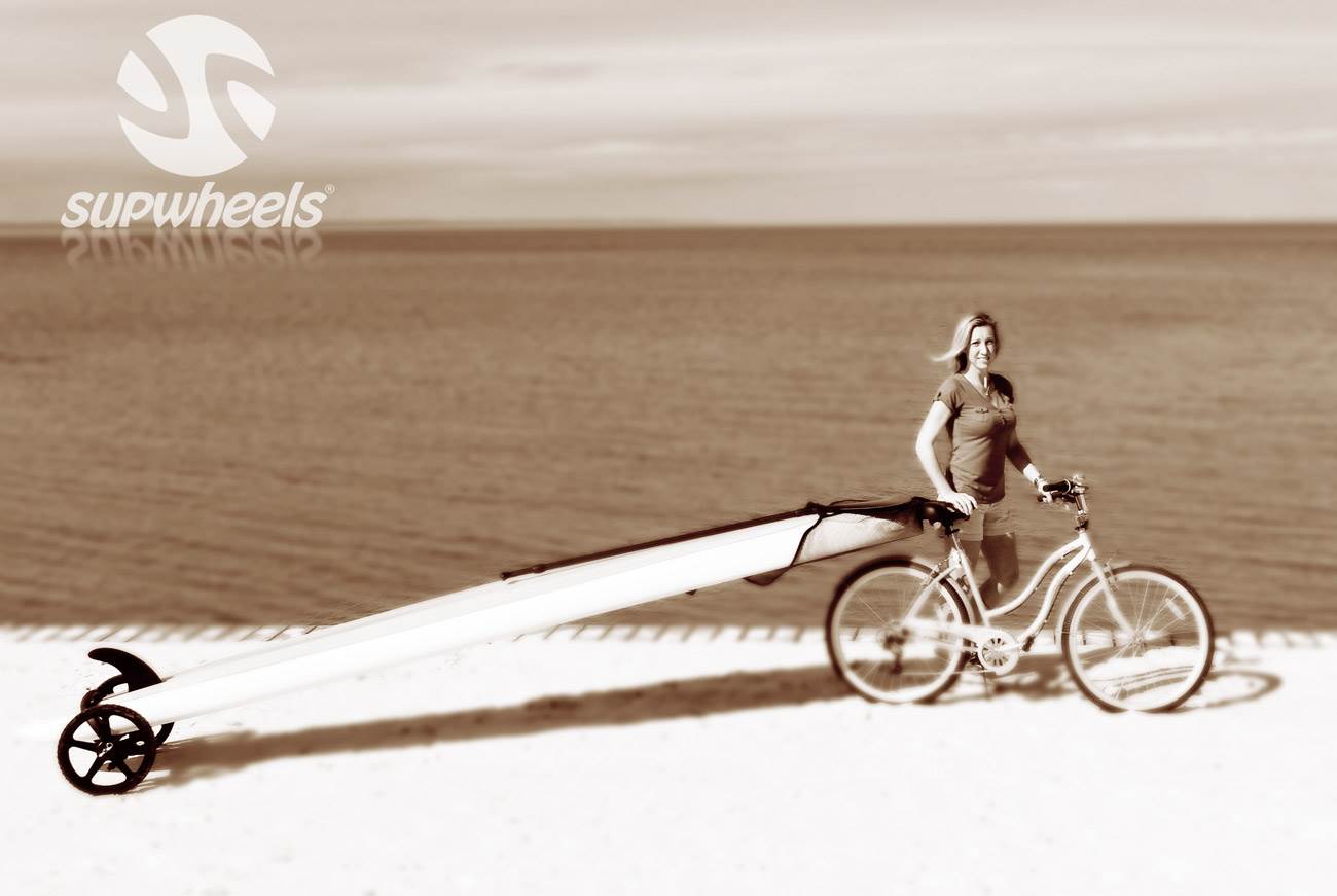 Surf board, SUP board or Kayak with a bike.