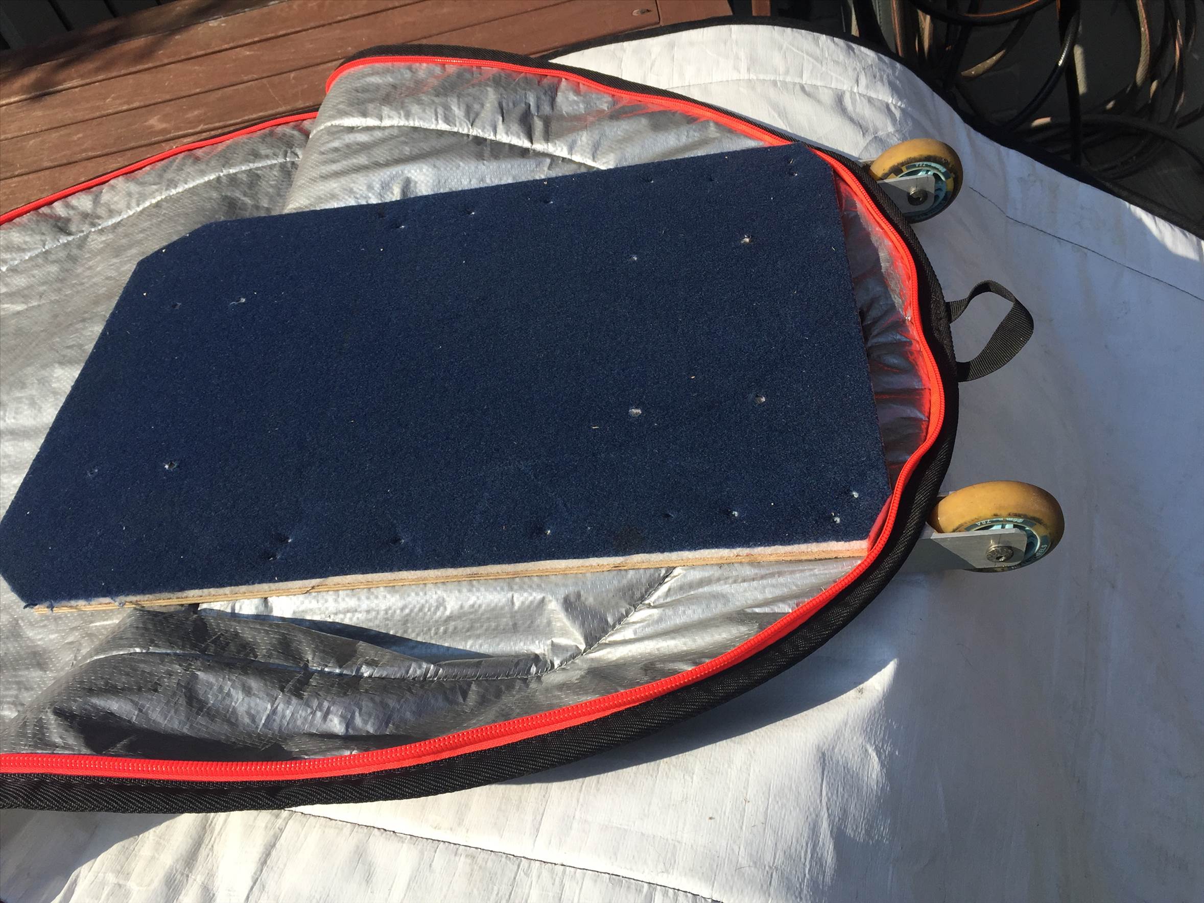 Board bag rollers