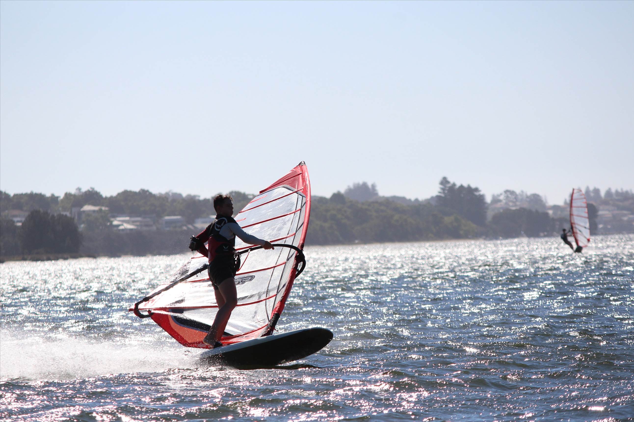 kid windsurfing