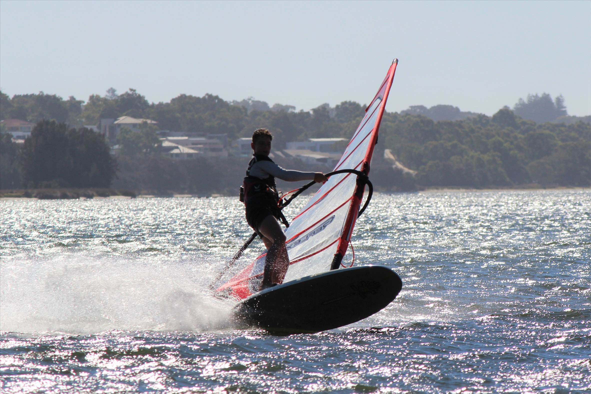 kid windsurfing