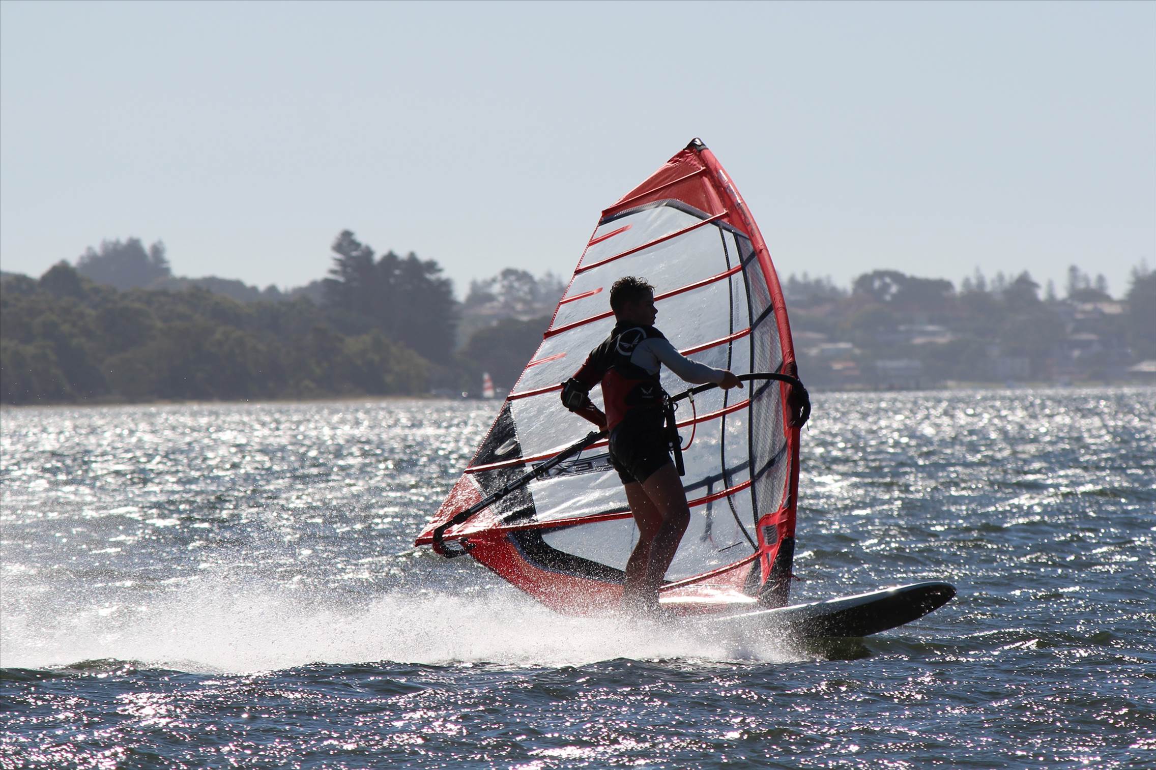 kid windsurfing